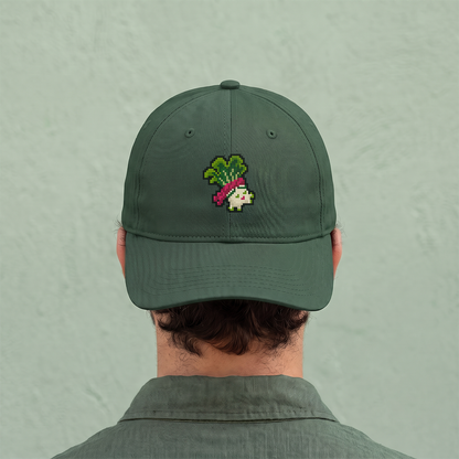 Person wearing green hat with AMiko Legends character